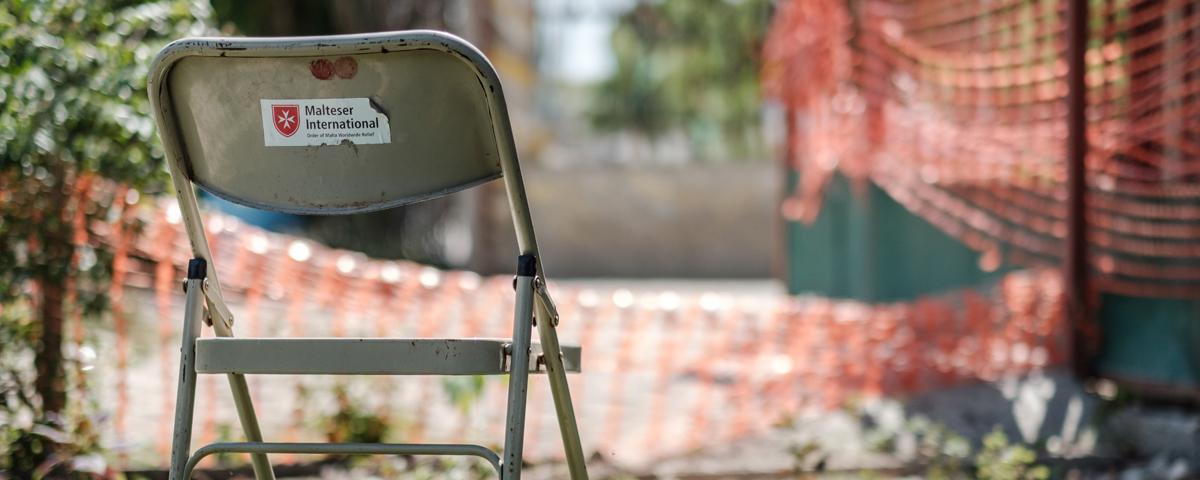 chair with MI logo - picture was taken in Haiti